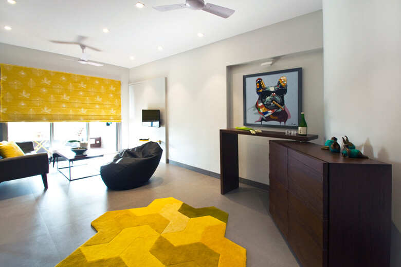 Living room with sunshine yellow mat and curtains