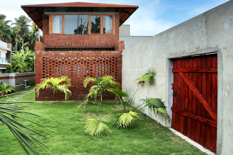 Striking Brick House Of Trivandrum, Best House Plan Designers In Trivandrum