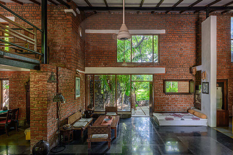 This Charming Brick House In Surat Coexists With Its Lush Surroundings 