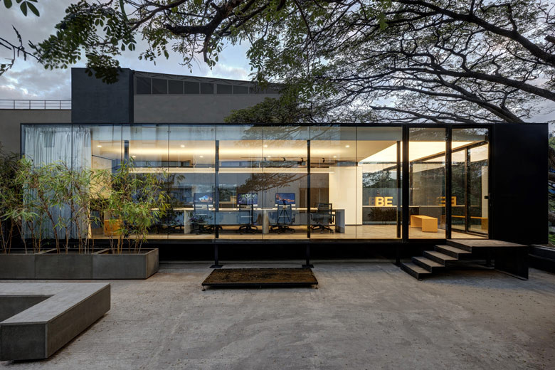 This tranquil workspace is perched on the terrace of a busy building |  